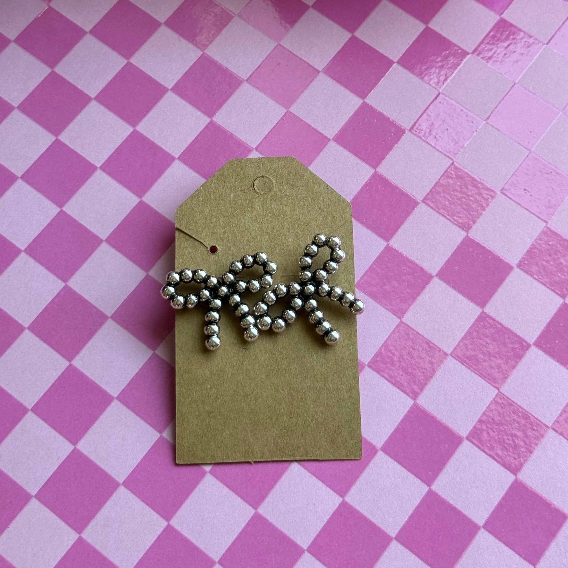 Silver bow earrings