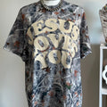 Camo “jesus loves you”